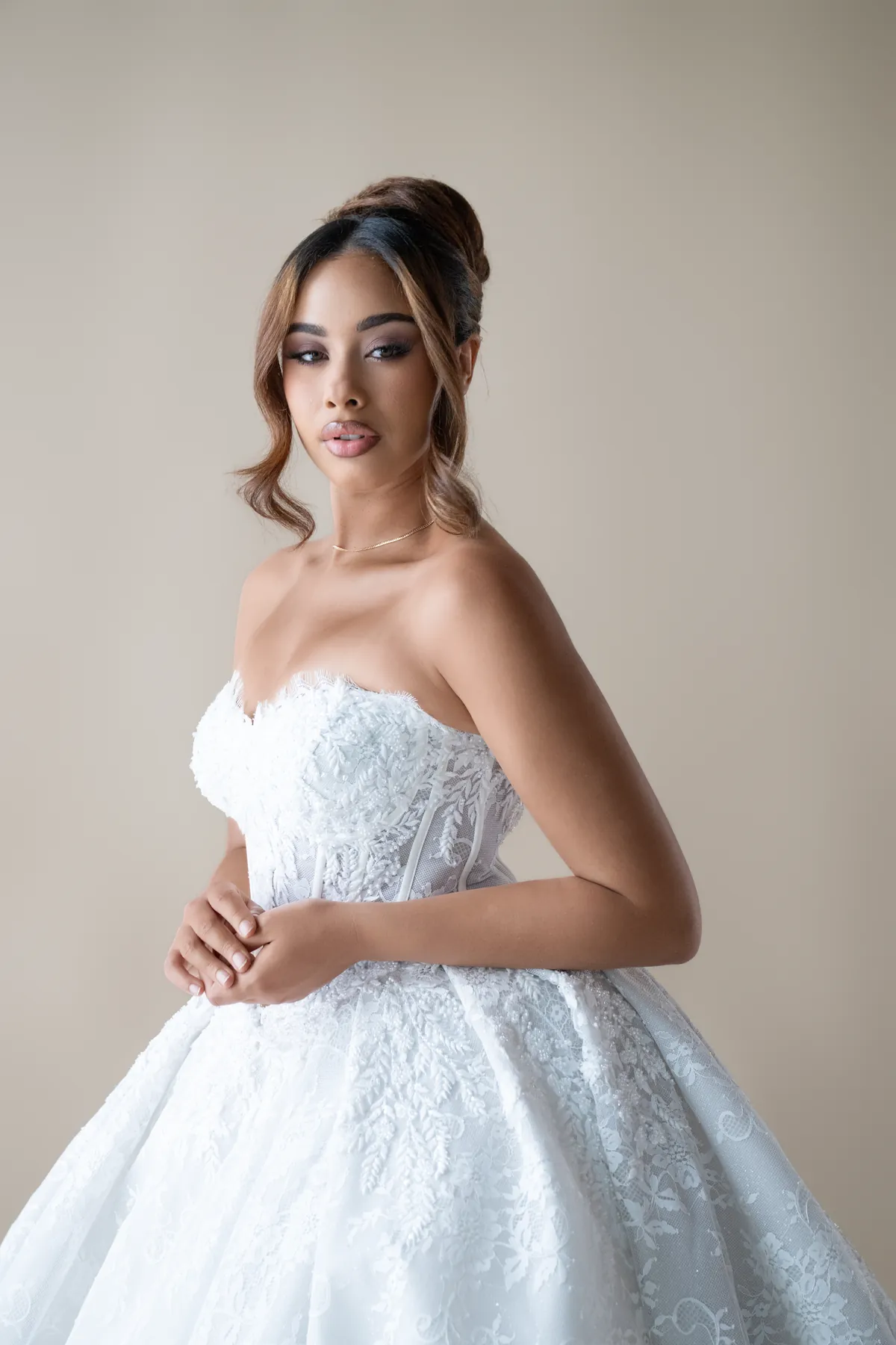 Robe de mariée du showroom Umel Couture disponible à la location